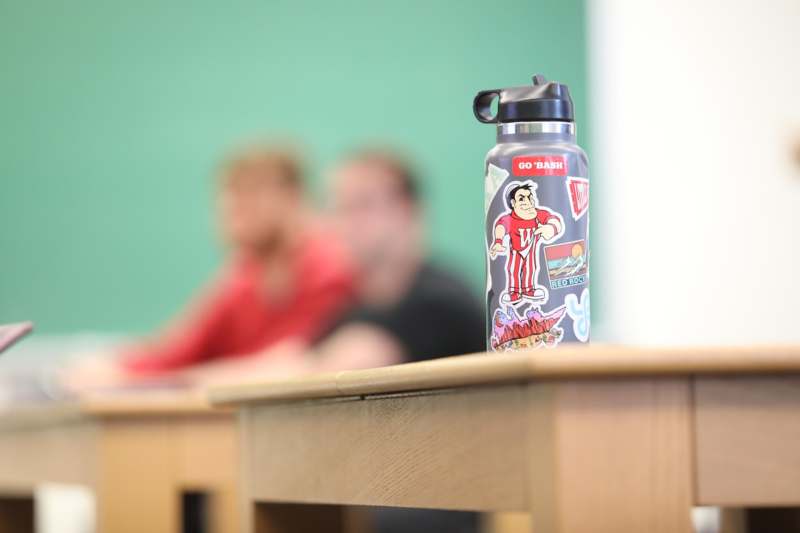 a water bottle on a desk