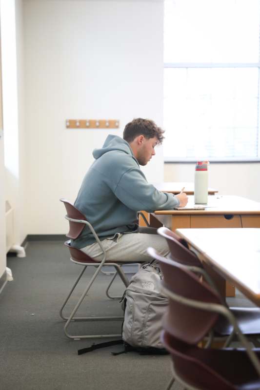 a man sitting at a desk