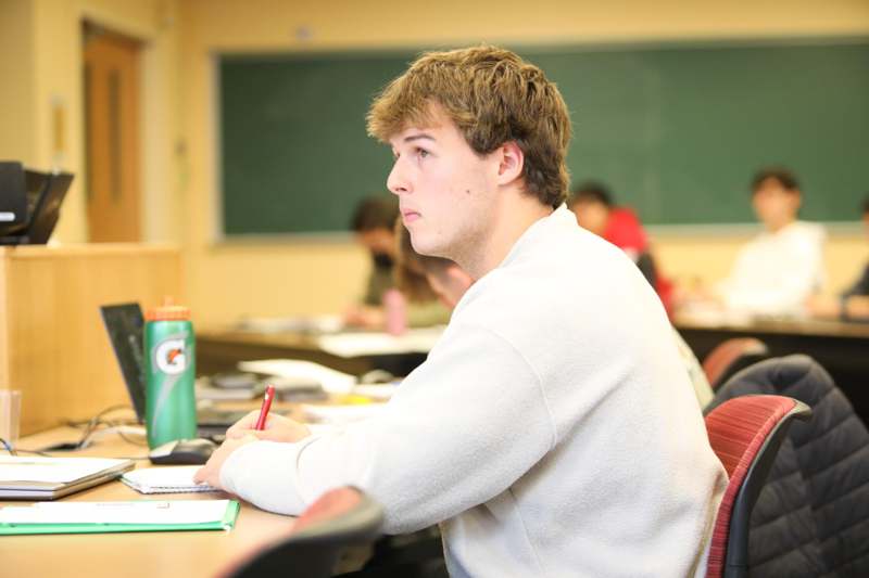 a man sitting at a desk