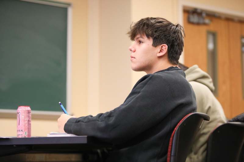 a man sitting at a desk