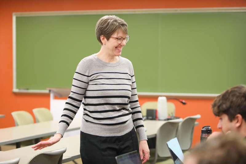 a woman in a striped shirt