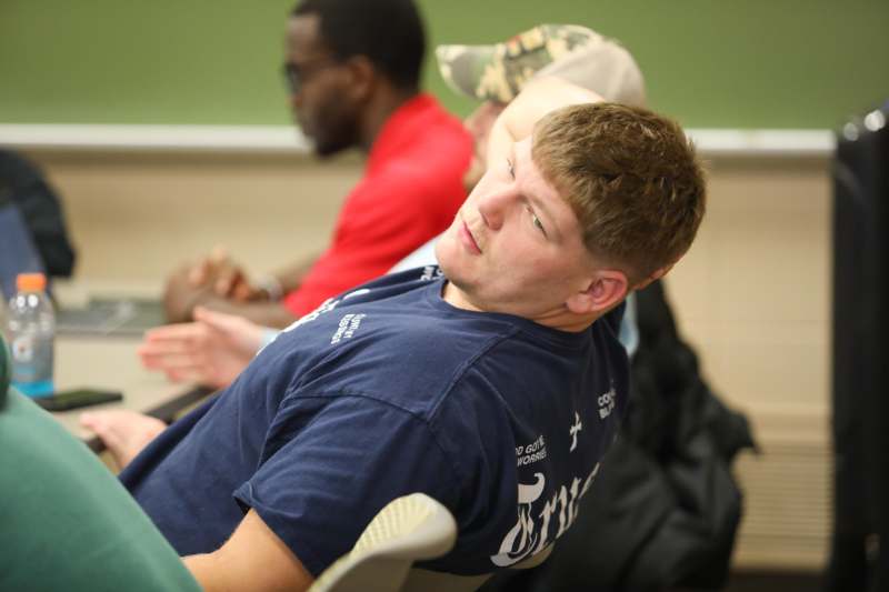 a man sitting in a chair