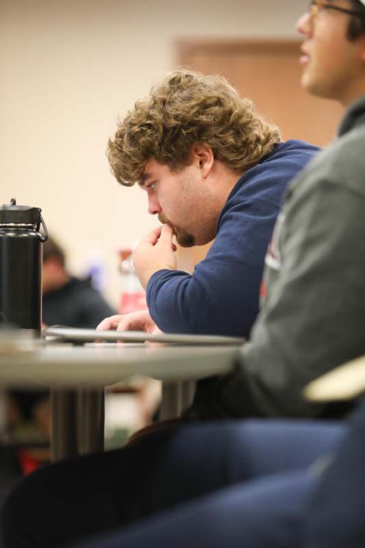 a man sitting at a table