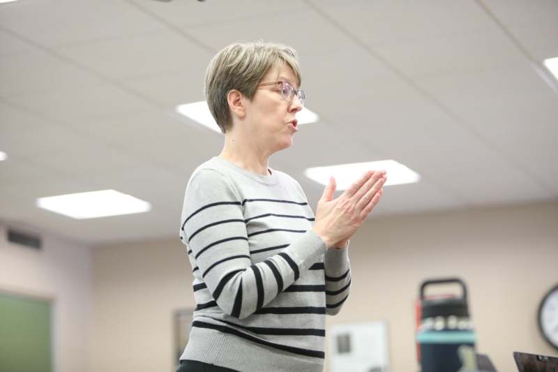 a woman in a striped shirt