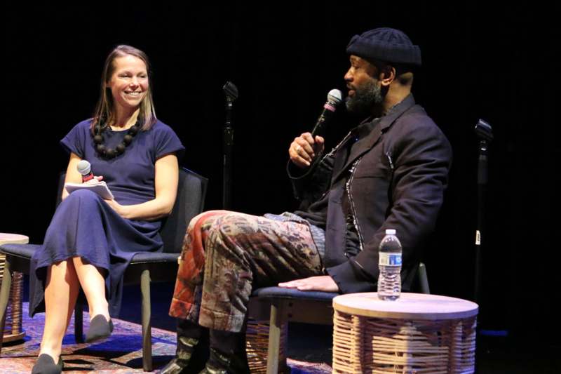 a man and woman sitting in chairs