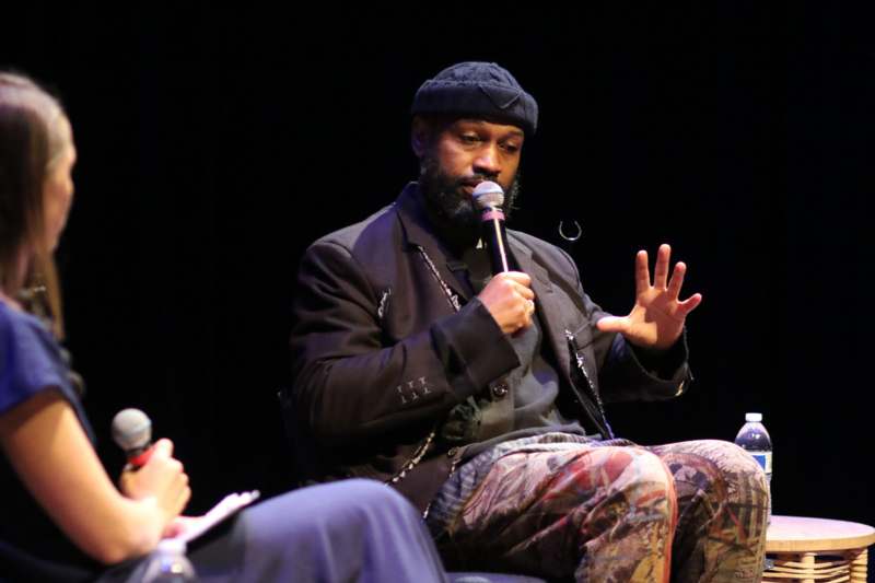 a man holding a microphone