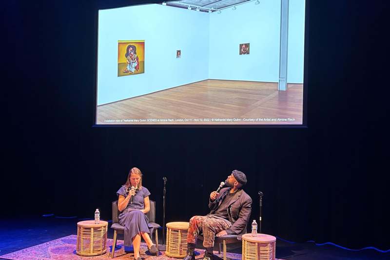 a man and woman on a stage