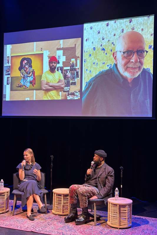a man and woman on stage