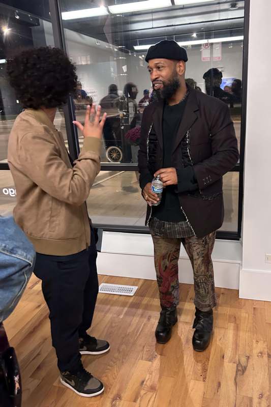 a man talking to a woman