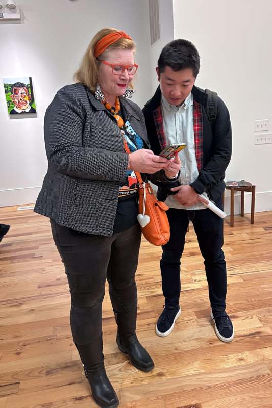 a woman looking at a phone