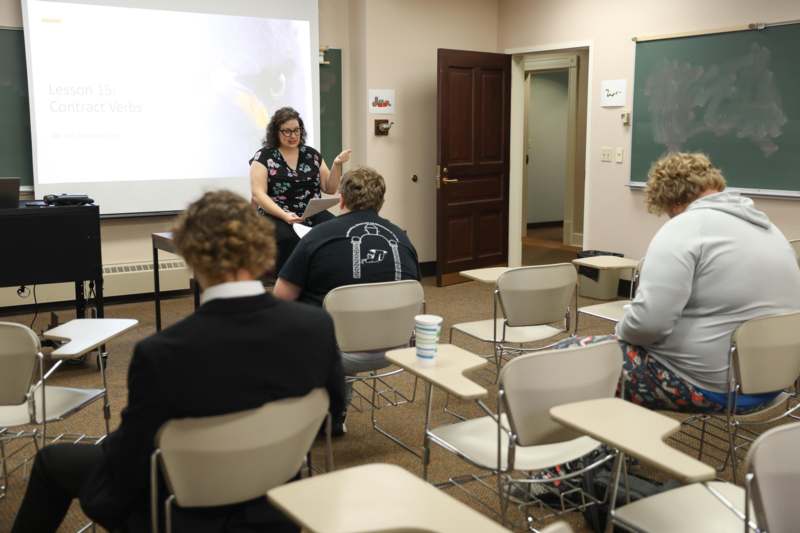Classroom: GRK 101 with Professor Theodora Kopestonsky - a woman standing in front of a classroom
