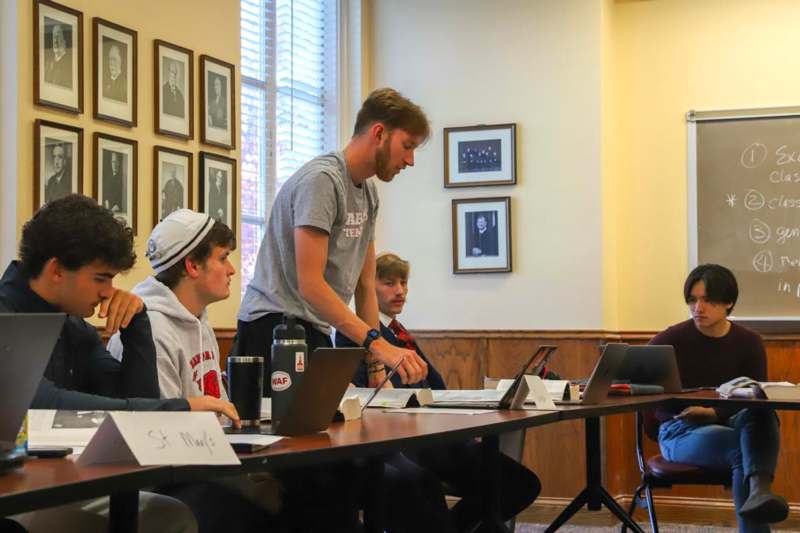a group of people around a table