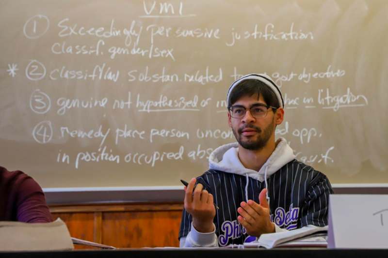 a man in a black and white striped shirt
