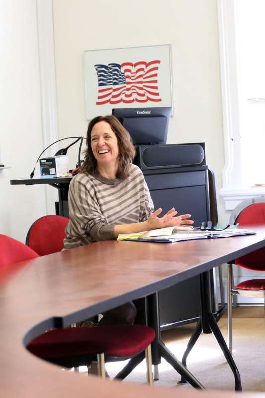 a woman sitting at a table