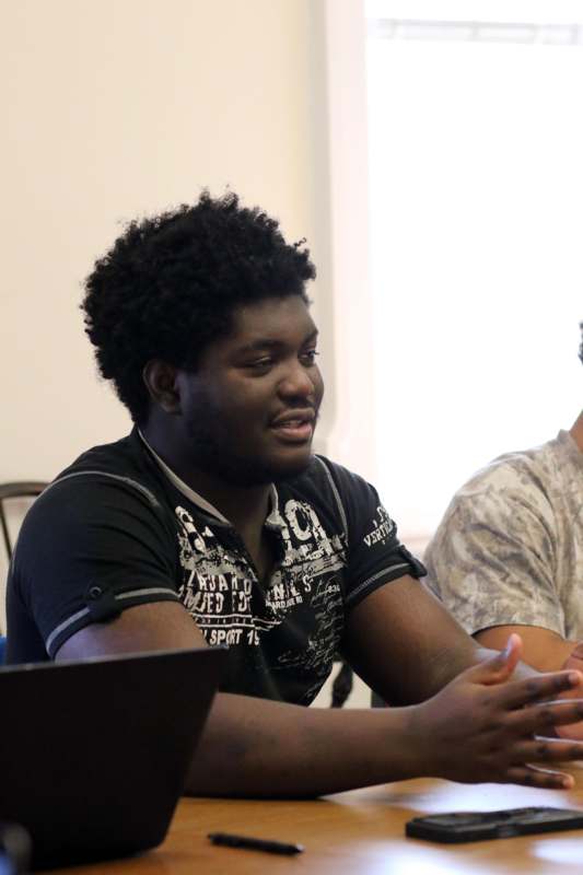 a man sitting at a table