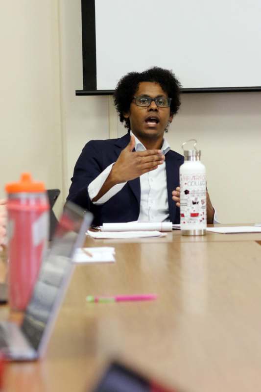 a man sitting at a table