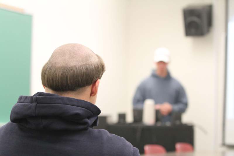 a man with a bald head