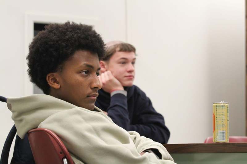 a man sitting in a chair