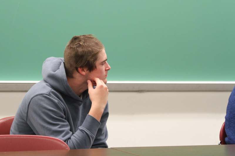 a man sitting at a desk