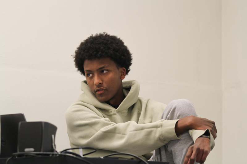 a man sitting on a table