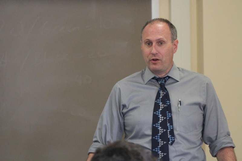 Classroom: PSY 231 with Professor Preston Bost - a man in a tie