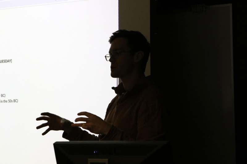 a man in a dark room