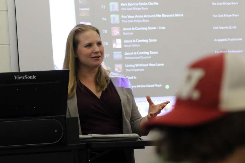Classroom: MUS 204 with Professor Mollie Ables - a woman standing in front of a screen