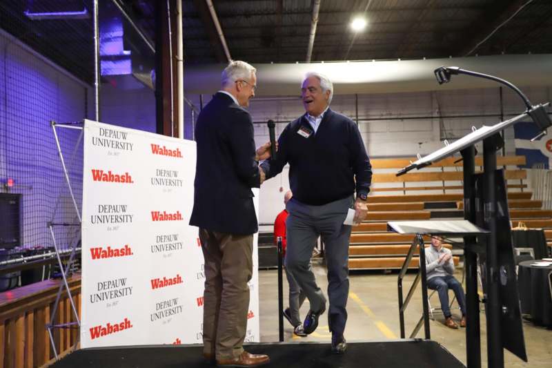 two men talking to each other