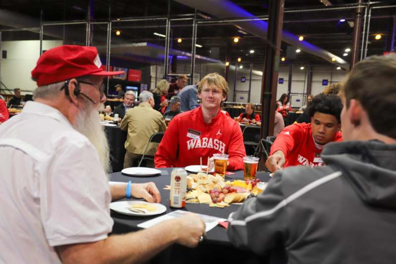 a group of people sitting at a table