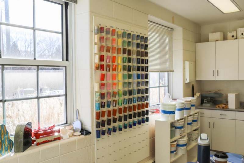 a wall with many colors on it