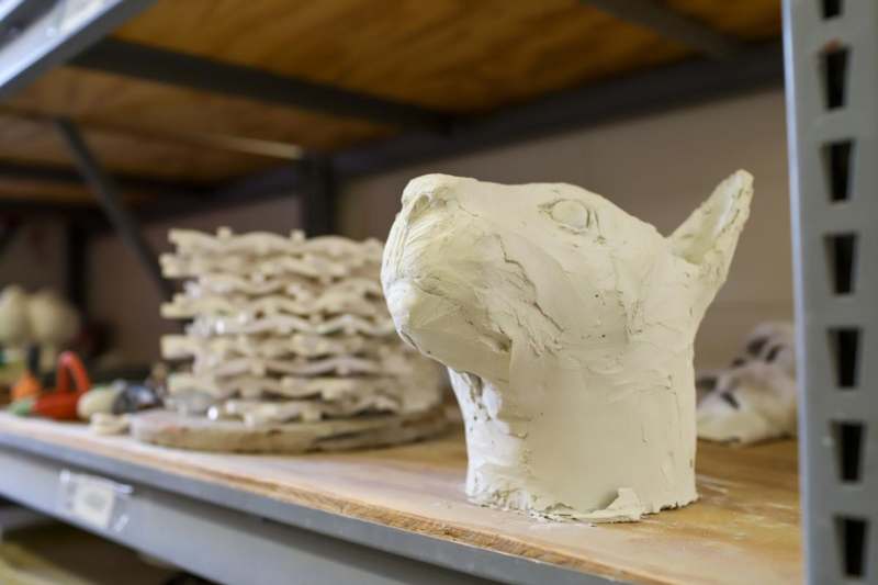 a sculpture of a rabbit on a table