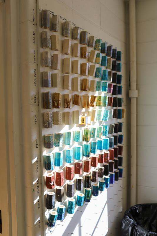 a wall with many colorful objects