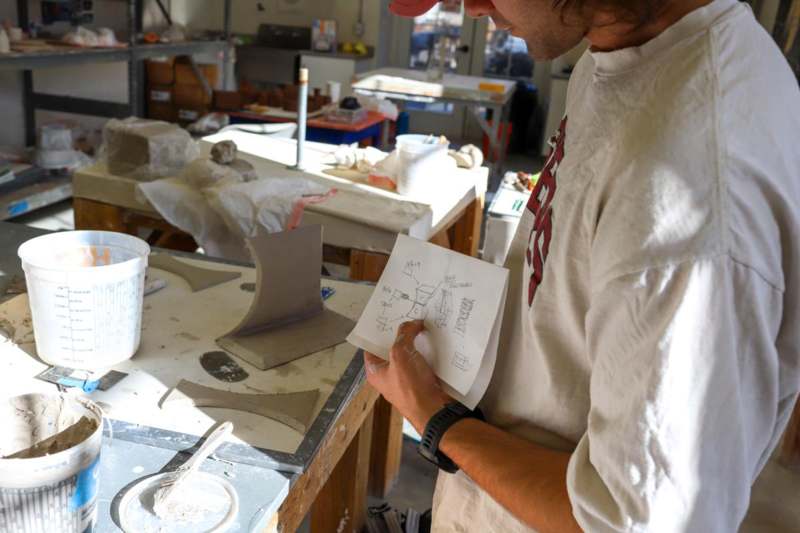 a man holding a piece of paper