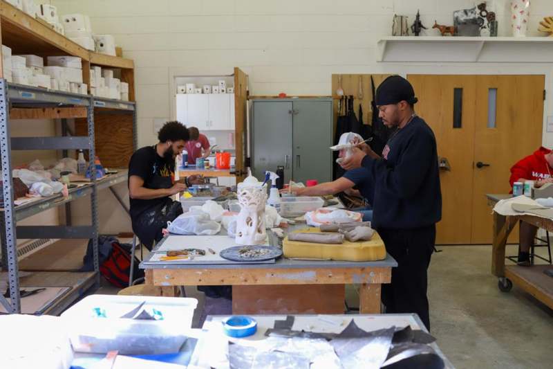 a group of people working in a room