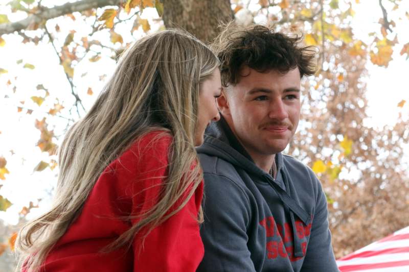 a man and woman sitting together