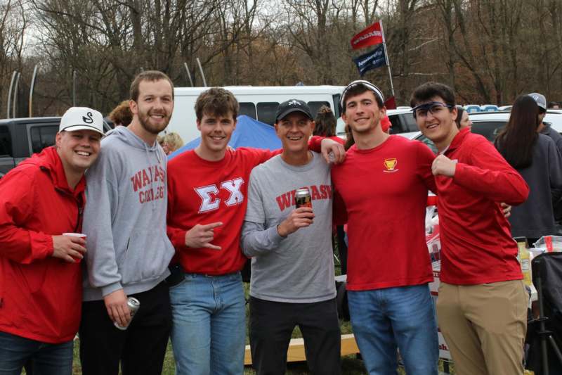 a group of men posing for a photo