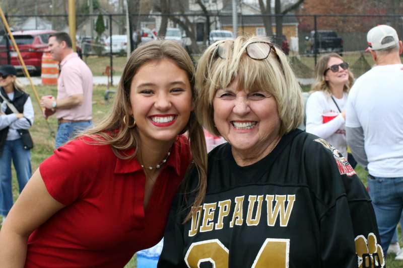 a woman and a woman posing for a picture