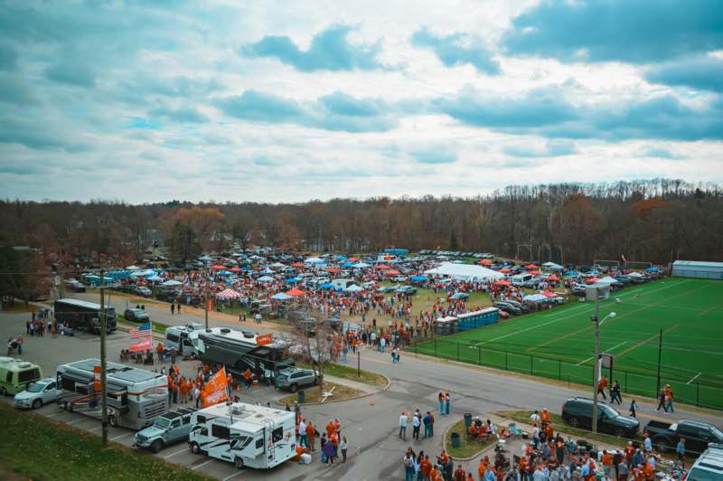 a crowd of people outside of a stadium