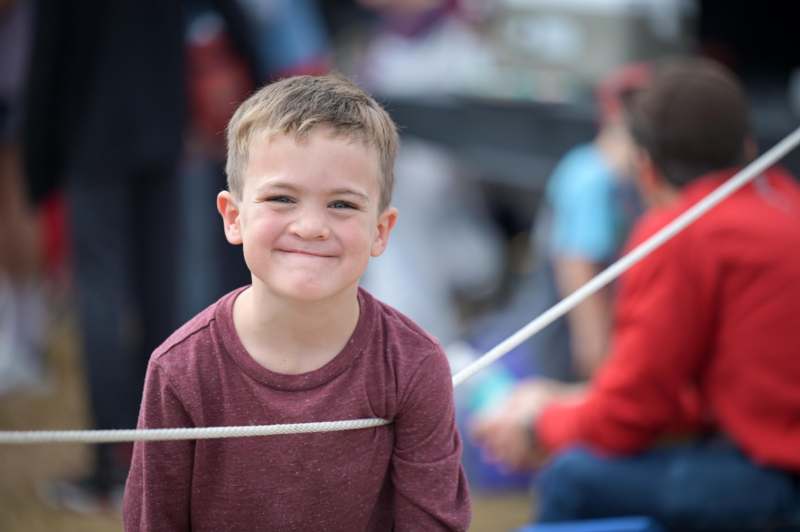a boy smiling at camera