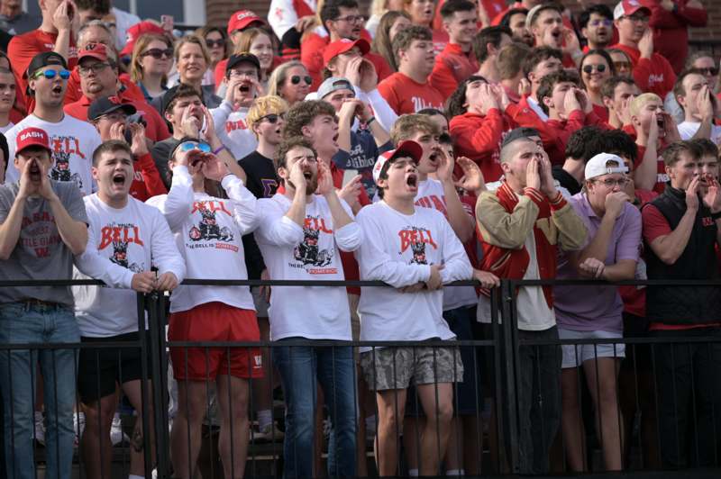 a group of people standing in a crowd