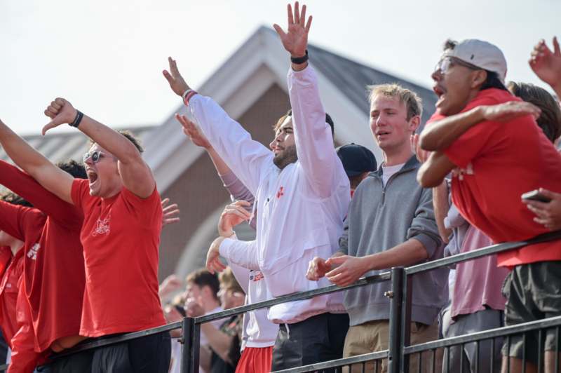 a group of people standing in a crowd
