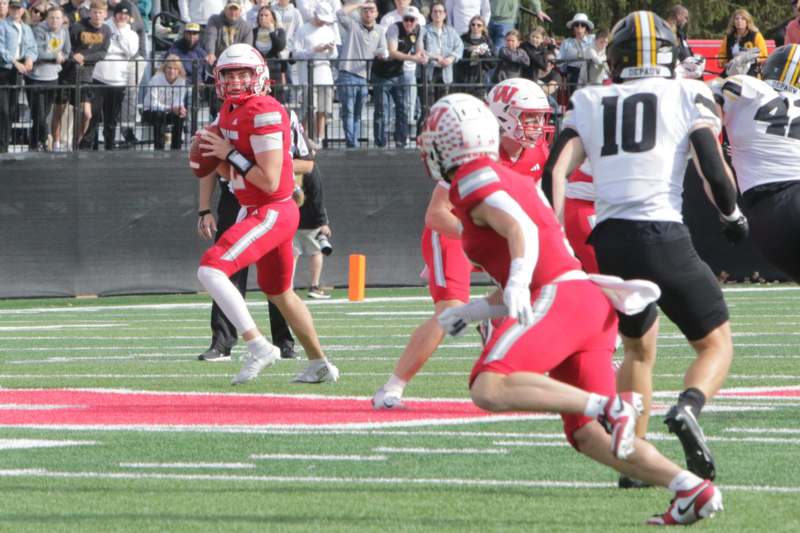 a football player running with the ball