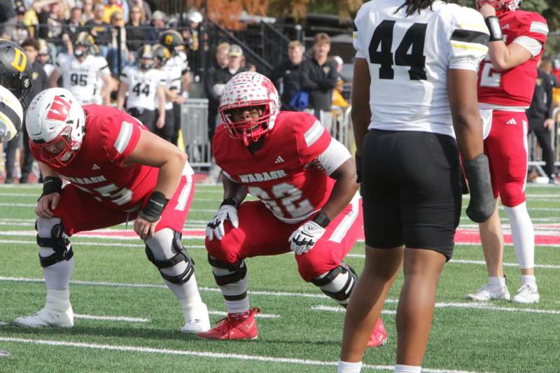 a football player in a red uniform