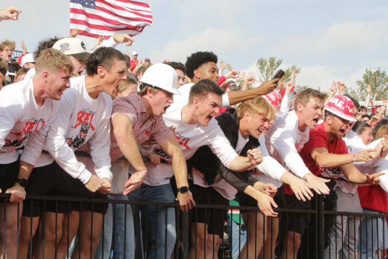 a group of people standing in a line