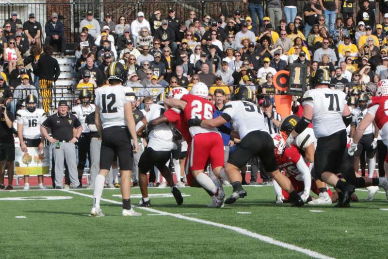 a group of people playing football