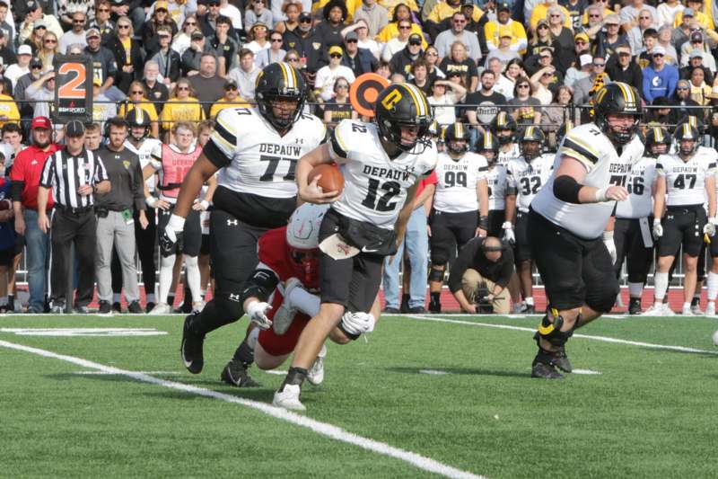 a group of people playing football