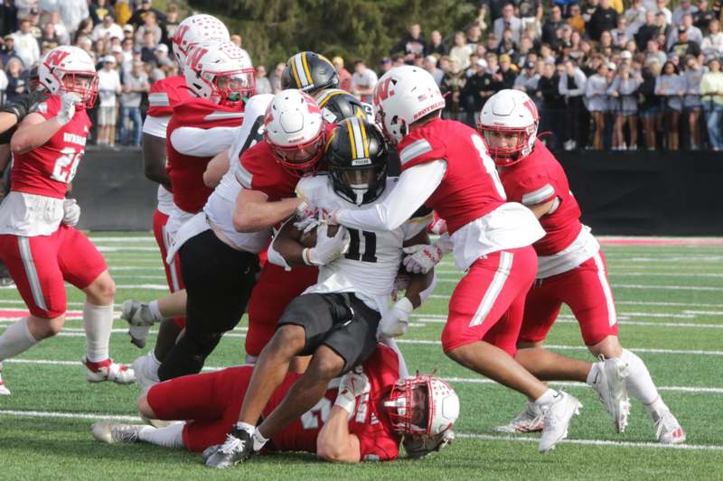 a group of football players on a field