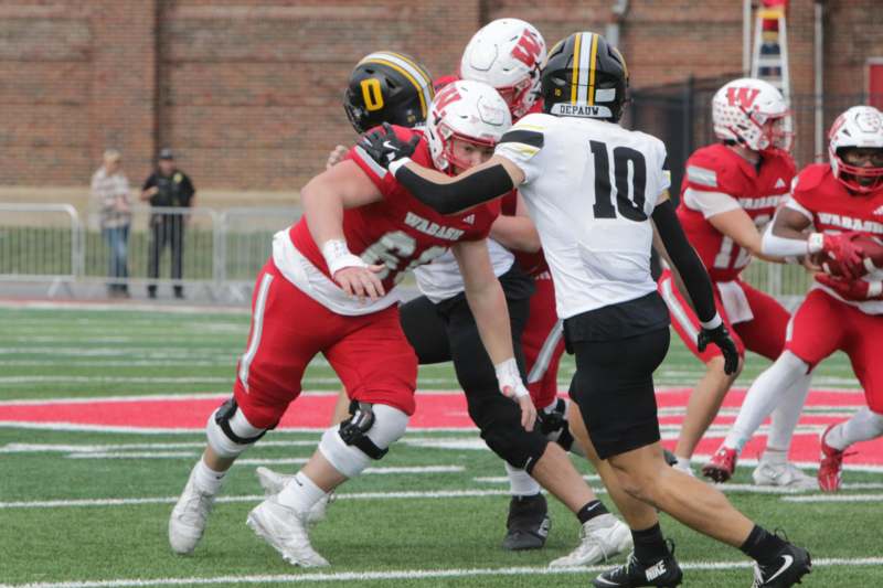 a group of people playing football