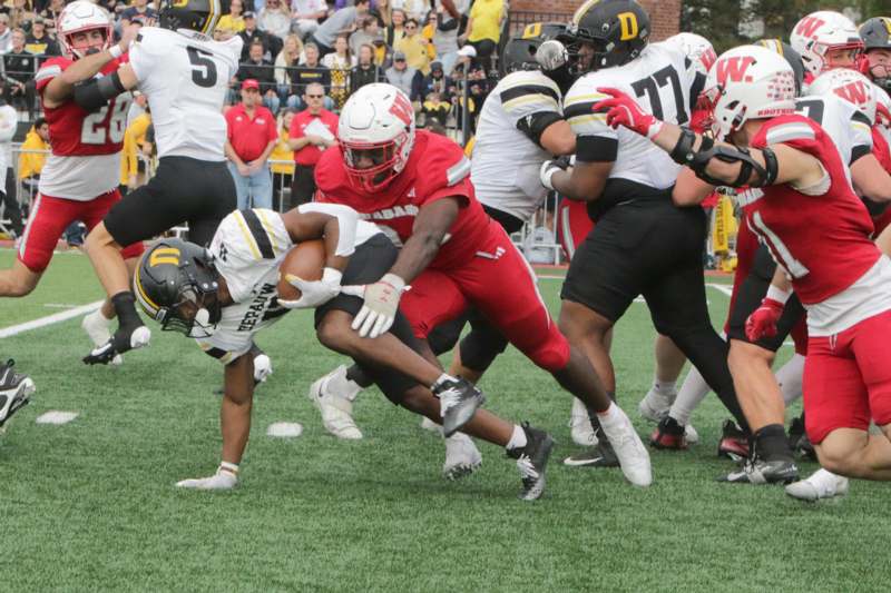 a group of people playing football