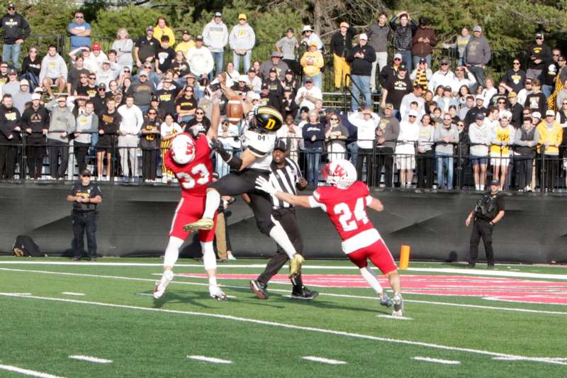 a group of people playing football